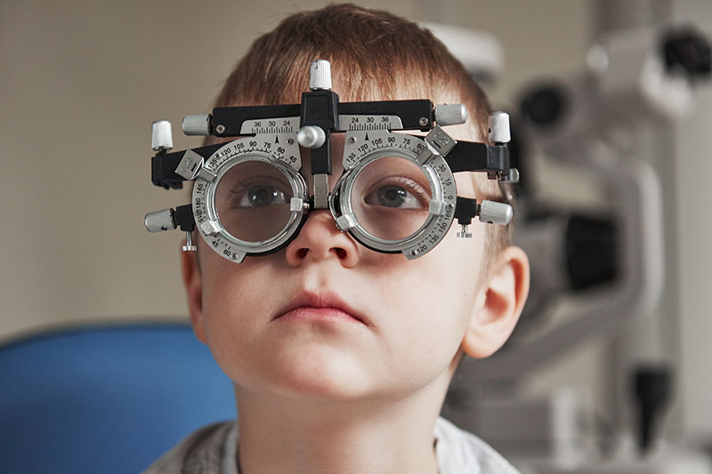 child in eye exam